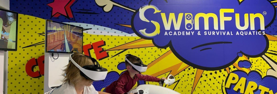 Mural depicting SwimFun logo and kids riding VR bikes